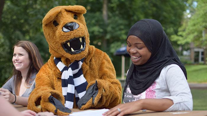 student with the Lion